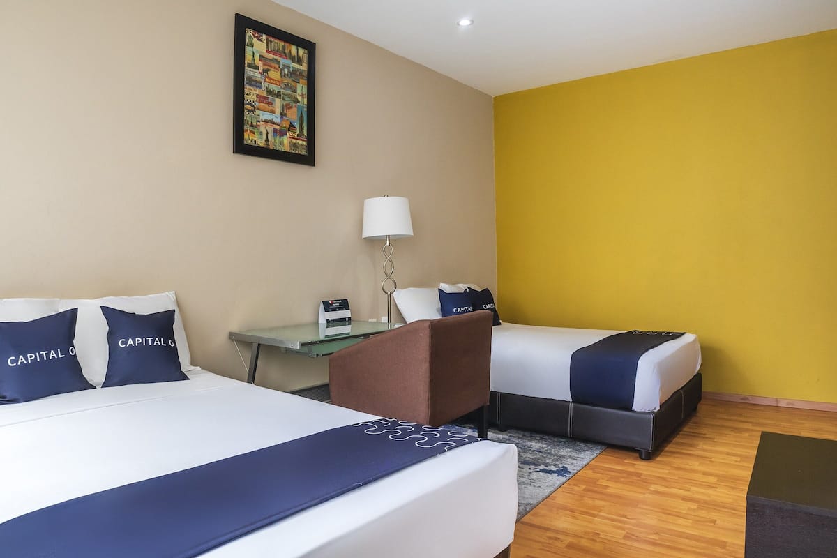 Deluxe Suite, 2 Double Beds, Private Bathroom | Desk, free WiFi, bed sheets