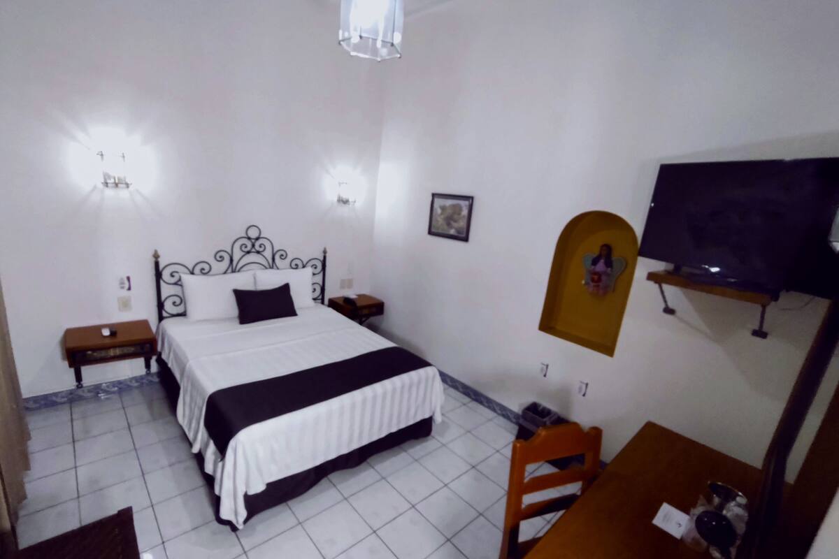 Economy Room | In-room safe, desk, laptop workspace, iron/ironing board
