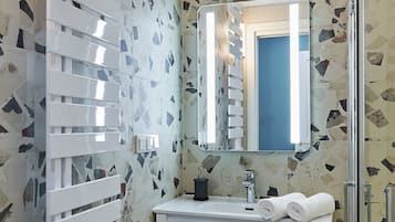 Hair dryer, towels, soap, shampoo