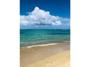 On the beach, sun loungers, beach towels