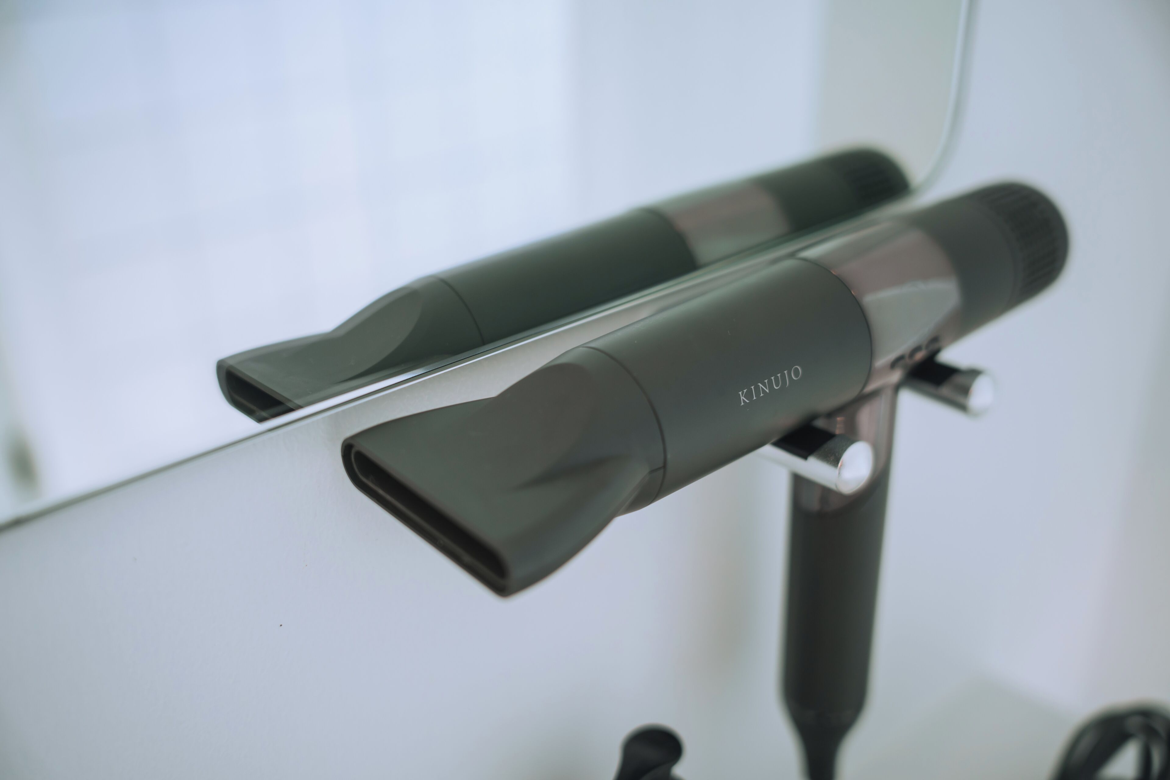 A hair dryer on a stand.