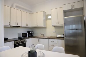 Fridge, microwave, oven, coffee/tea maker