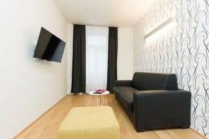 Apartment (Tabor Sun) | Wohnzimmer | Fernseher