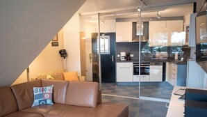 Living room - Ferienwohnung 37 mit Meerblick, Residenz Meeresbrandung Duhnen (Cuxhaven)