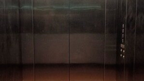An elevator with metallic walls and a marble floor. - Belmorris Greentown Hotel (Ipoh)