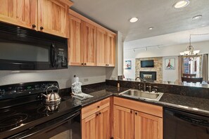 Microwave, stovetop, dishwasher, coffee/tea maker