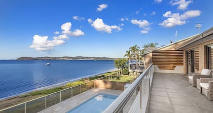 Seaside Sanctuary - Waterfront Luxury Home with Heated Pool