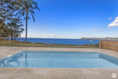 Seaside Sanctuary - Waterfront Luxury Home with Heated Pool