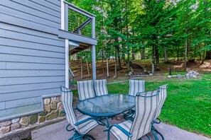 Outdoor dining - Dog-friendly, lakefront getaway w/ a wraparound balcony, beach, & boat access (Manitowish Waters)