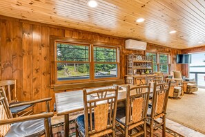 Dining - Dog-friendly, lakefront getaway w/ a wraparound balcony, beach, & boat access (Manitowish Waters)