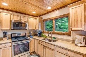 Fridge, microwave, oven, stovetop - Dog-friendly, lakefront getaway w/ a wraparound balcony, beach, & boat access (Manitowish Waters)