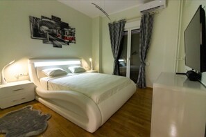 1 غرفة نوم ومكواة/لوح كي وواي فاي وملاءات أسرّة