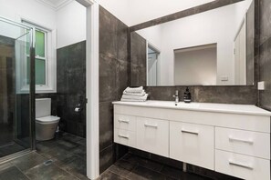 Bathtub, hair dryer, towels