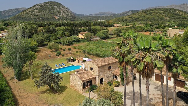 A stone villa with a swimming pool, surrounded by lush greenery and mountains. - COLLET VELL. Lovely stone-clad villa with large garden (Pollensa)