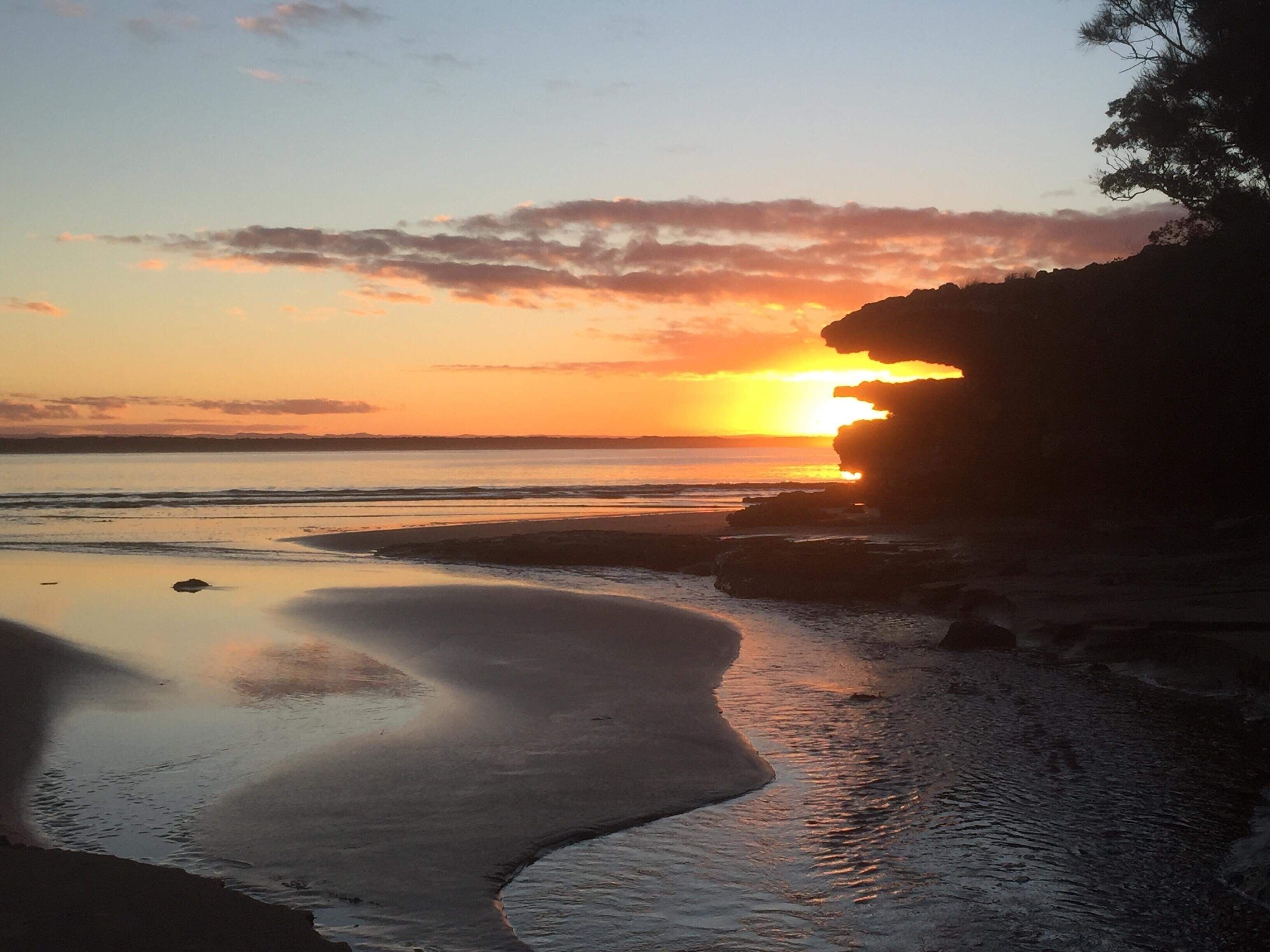 On the beach, sun-loungers