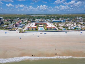 On the beach, sun-loungers, beach towels - Sunrise Paradise, New Smyrna Beach Condo (New Smyrna Beach)