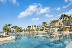 4 outdoor pools, open 8:00 AM to 6:00 PM, free pool cabanas