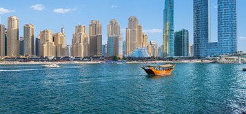 On the beach, white sand, sun-loungers, beach umbrellas