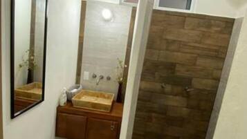 Shower, hair dryer, towels, toilet paper