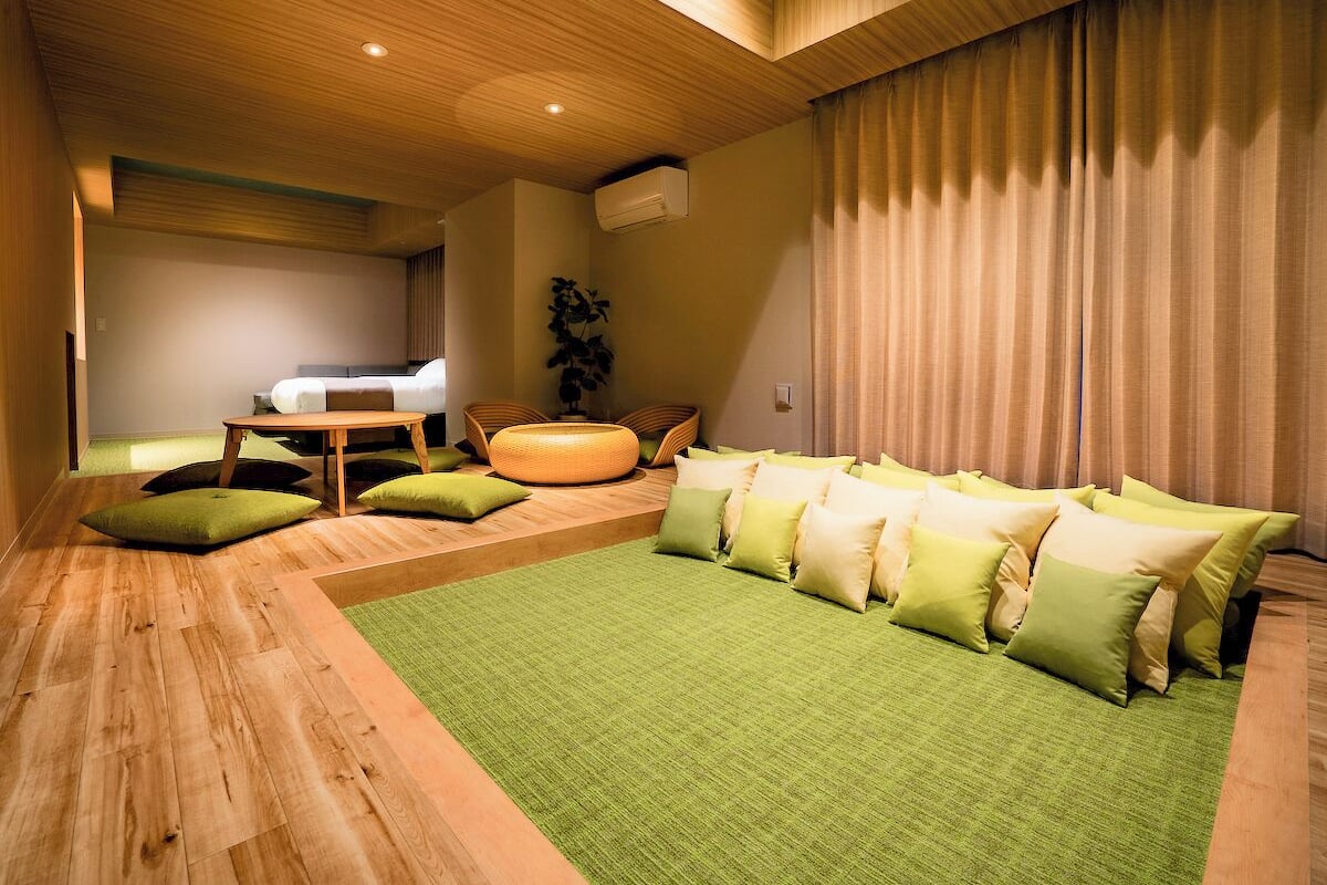 Habitación | Área de sala de estar | Televisión de pantalla plana 