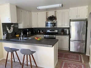 Fridge, microwave, oven, stovetop - Ocean View House Few Steps from Miramar Beach  (Half Moon Bay)