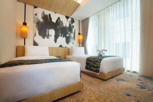 Roupas de cama premium, frigobar, cofres nos quartos, escrivaninha