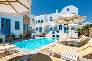 Seasonal outdoor pool, pool umbrellas, pool loungers