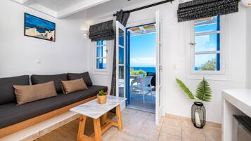 Deluxe-Suite, Whirlpool, Meerblick | Wohnbereich