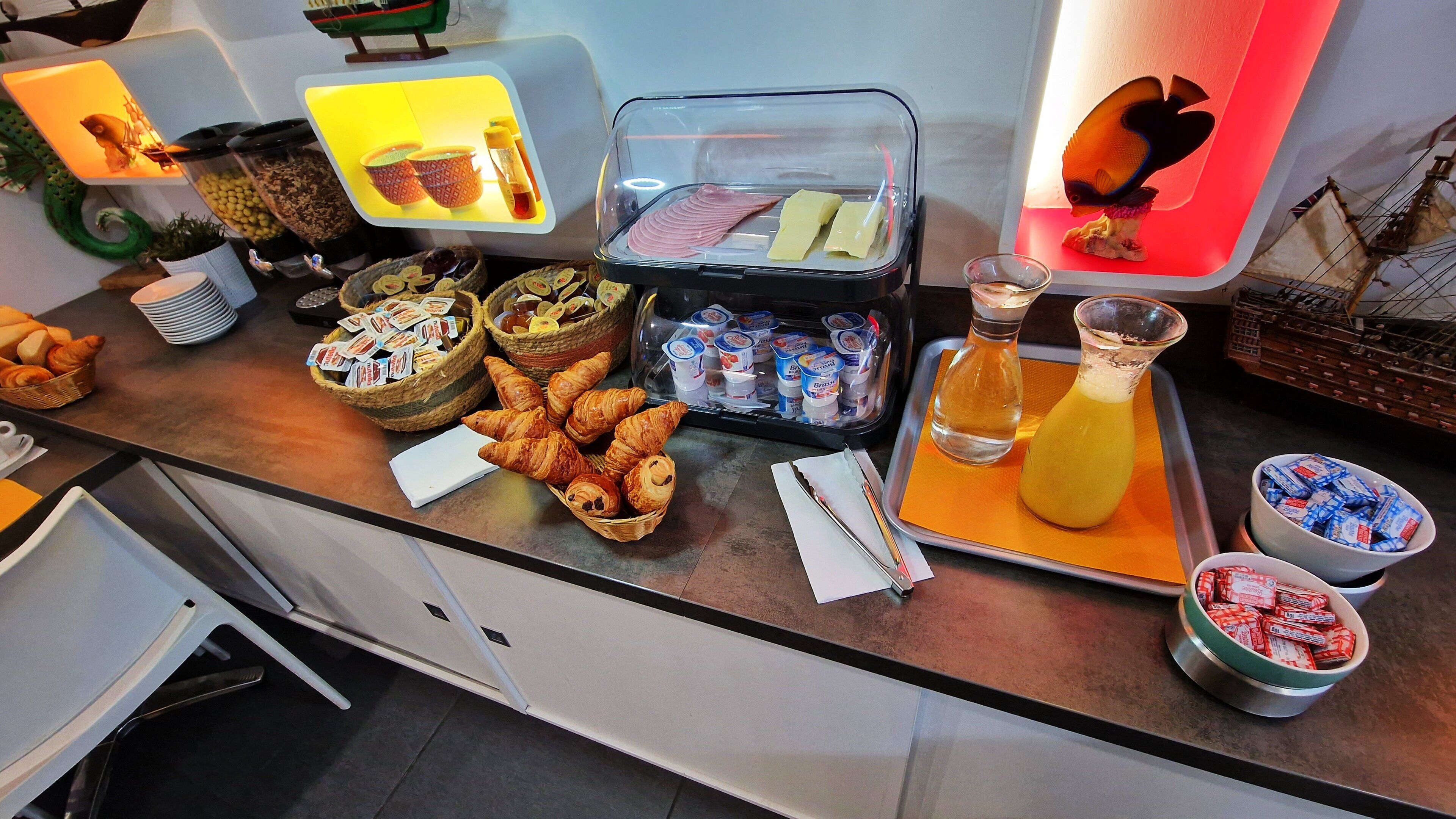 daily buffet breakfast (eur 8 per person)