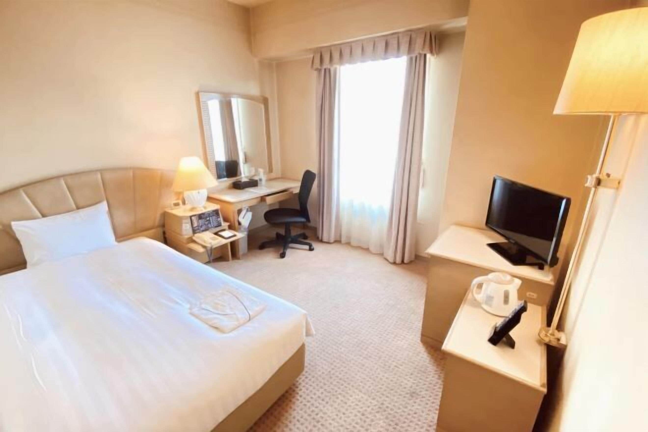 Desk, iron/ironing board, free WiFi, bed sheets