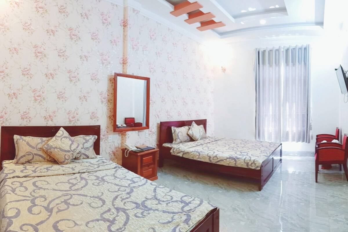 Deluxe Quadruple Room | Minibar, desk, laptop workspace, free WiFi