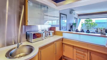 Clifton YOLO Spaces - Clifton Beachfront Executive | Private kitchen | Full-size fridge, microwave, oven, stovetop