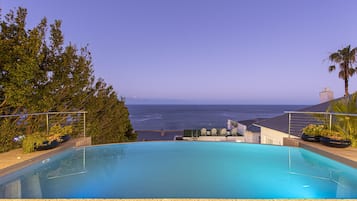 Seasonal outdoor pool, pool loungers