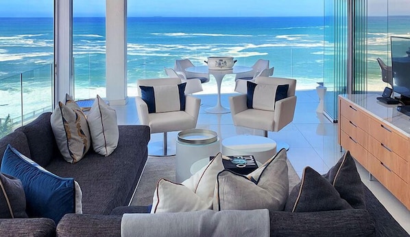 Clifton YOLO Spaces Clifton Beachfront Penthouse | Living area | Flat-screen TV - Clifton YOLO Spaces – Clifton Beachfront Penthouse (Cape Town)