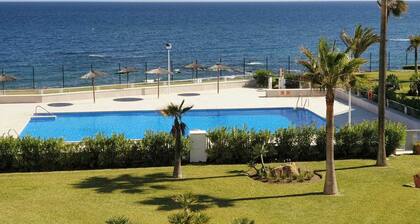 Spacious 2 bed, 2 bath frontline beach house. Sea & pool views metres from sea