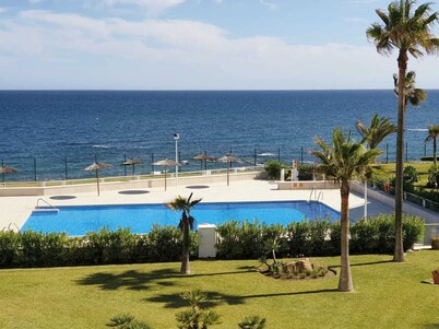 Spacious 2 bed, 2 bath frontline beach house. Sea & pool views metres from sea