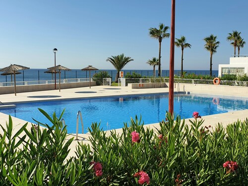 Spacious 2 bed, 2 bath frontline beach house. Sea & pool views metres from sea