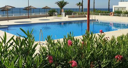 Spacious 2 bed, 2 bath frontline beach house. Sea & pool views metres from sea