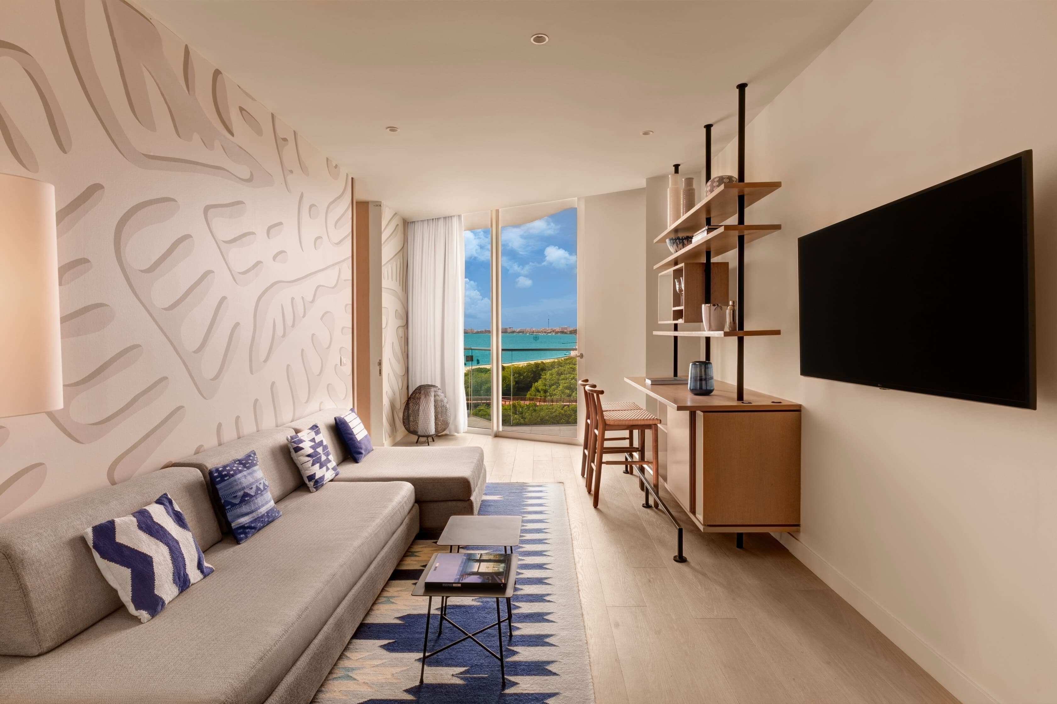 premier suite, 1 bedroom, oceanfront | living area | 42-inch smart tv with cable channels, tv