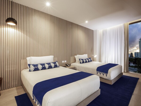 Ropa de cama de alta calidad y minibar 
