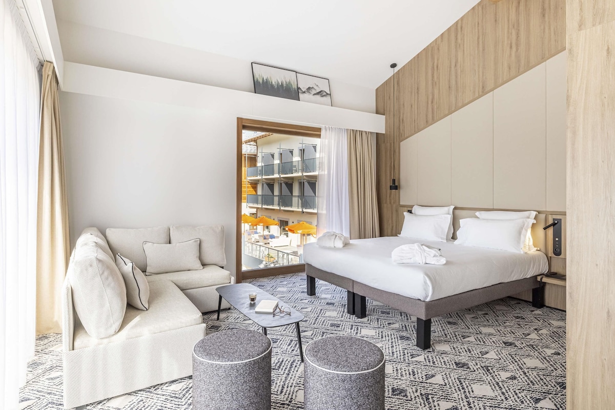 Suite ejecutiva, 1 cama matrimonial y sofá cama, balcón | Ropa de cama de alta calidad y espacio para trabajar con laptop