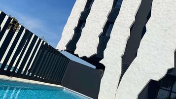 Seasonal outdoor pool, pool umbrellas, sun loungers