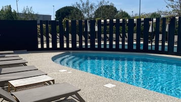 Seasonal outdoor pool, pool umbrellas, sun loungers