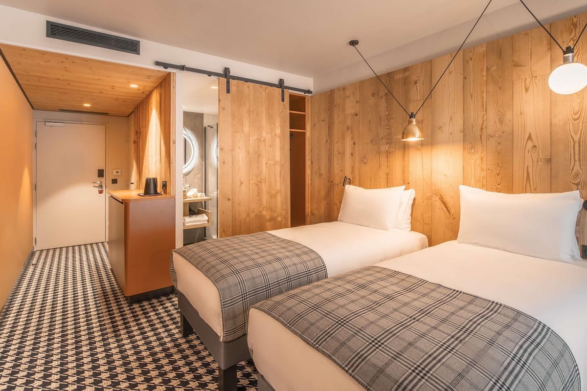 Double room with balcony, village view, double bed or two single beds, shower with disabled access | In-room safe, soundproofing, free cribs/infant beds, free WiFi