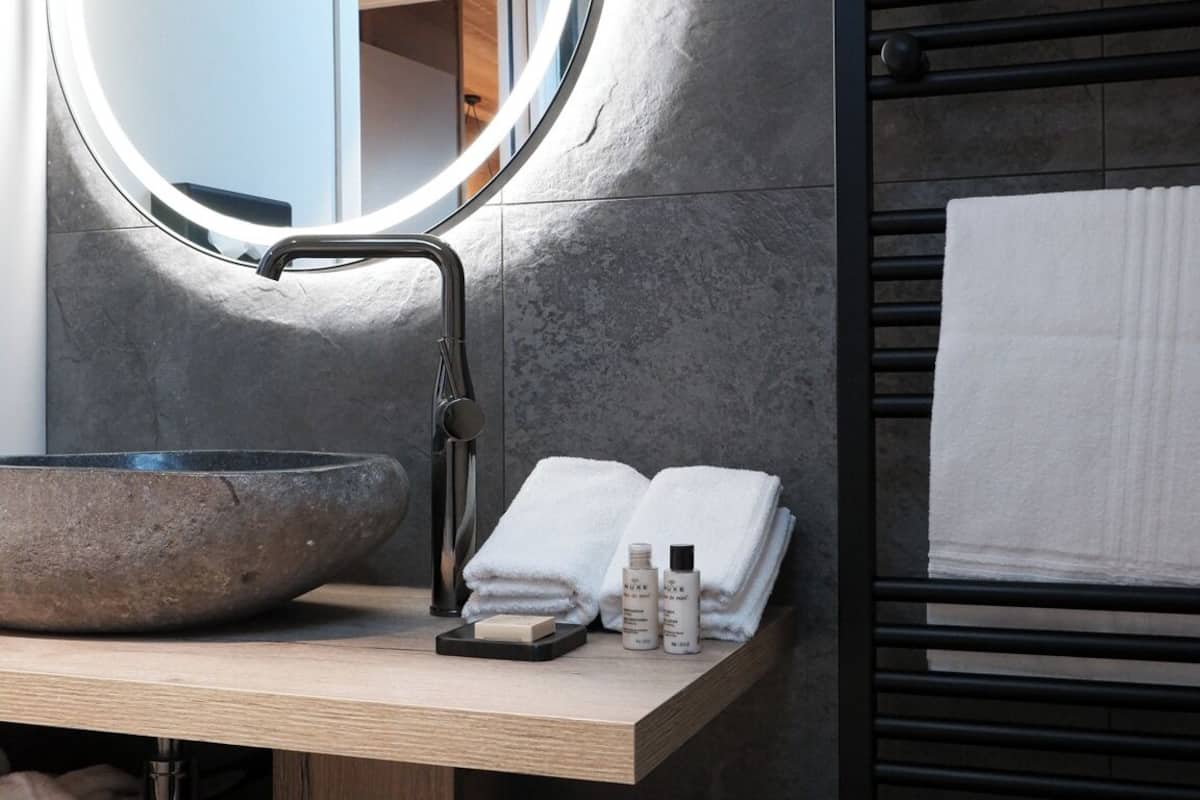 eco-friendly toiletries, hair dryer, bathrobes, slippers