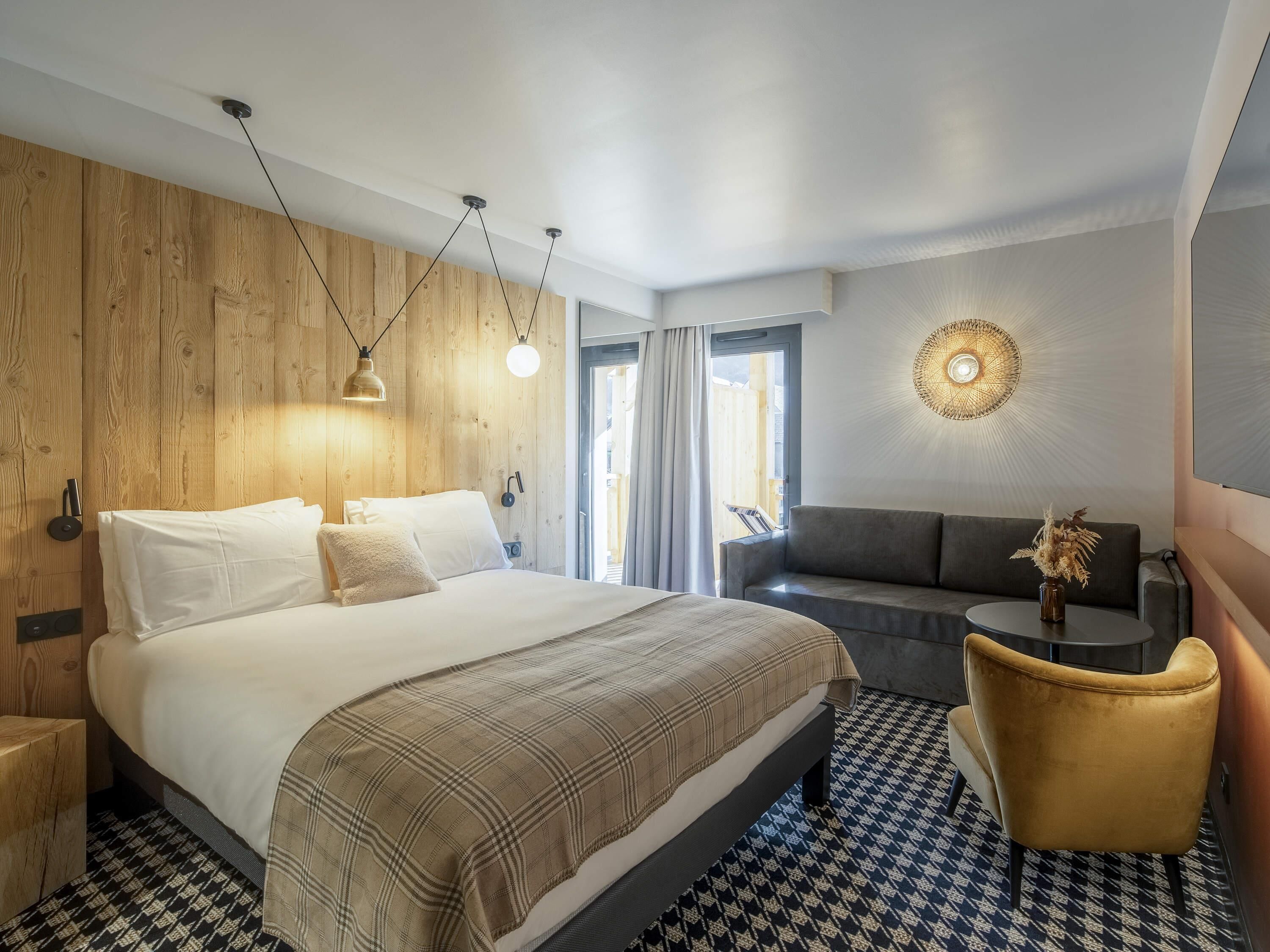 Comfort Triple Room, Balcony (village view) | In-room safe, soundproofing, free cribs/infant beds, free WiFi