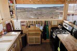 Fridge, stovetop, coffee/tea maker, electric kettle