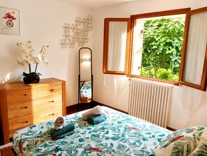 1 bedroom, desk, iron/ironing board, travel cot