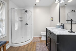 Combined shower/tub, hair dryer, towels, toilet paper