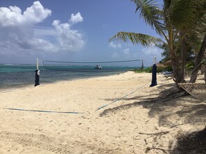 On the beach, sun loungers, beach towels
